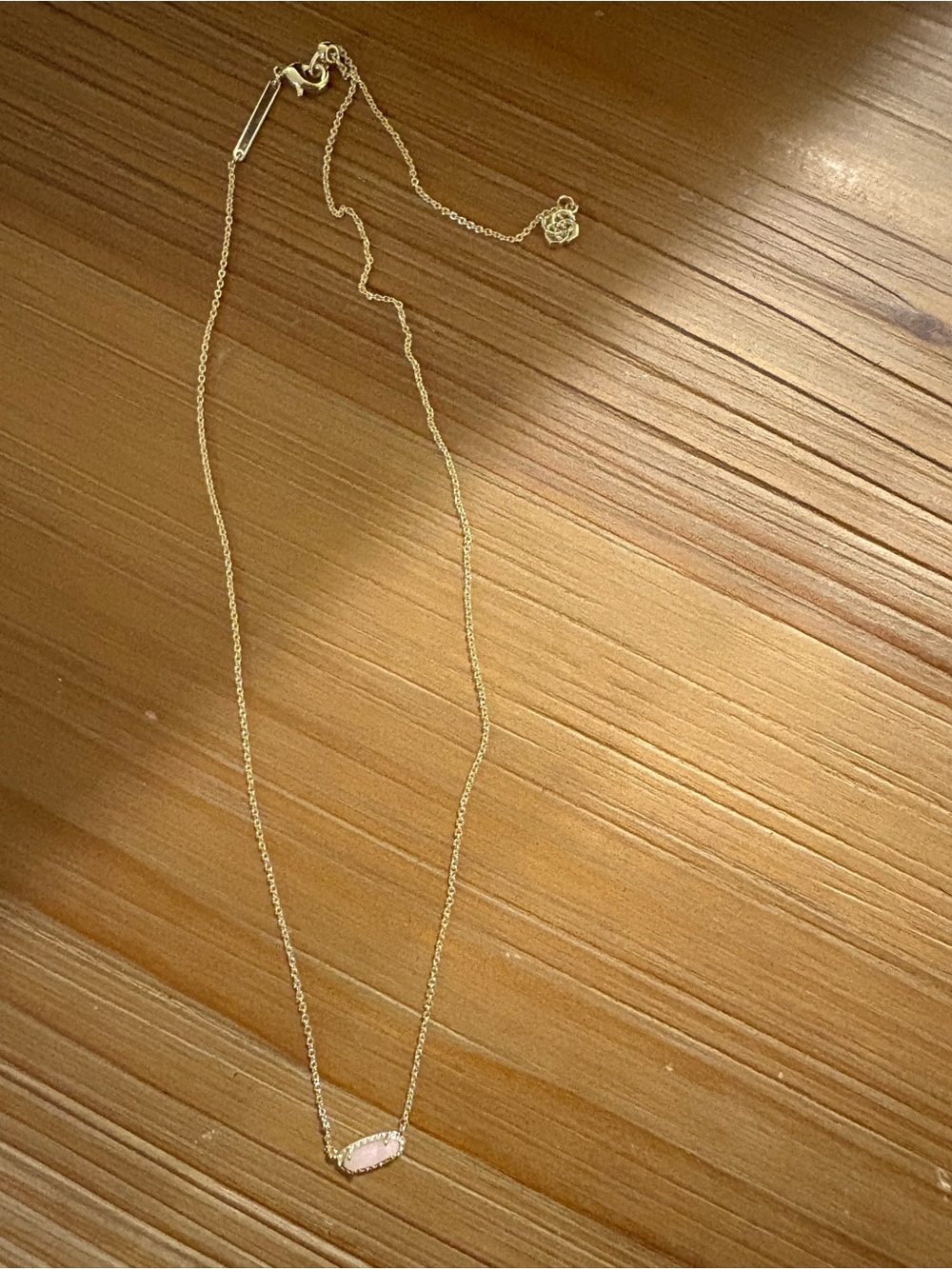 Kendra Scott Gold Necklace with Light Pink Oval Stone Pendant